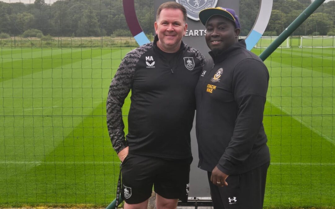 Coach Mike Observes Young Talent During Match Between Burnley FC Academy and Select USA Squad
