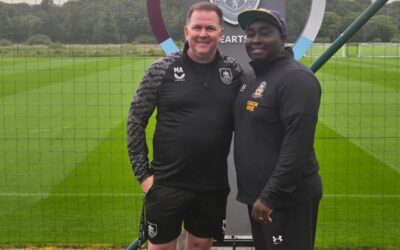 Coach Mike Observes Young Talent During Match Between Burnley FC Academy and Select USA Squad